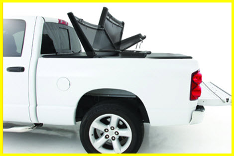 Smittybilt Smart Cover Folding Tonneau Cover is manufactured from 6061 aircraft aluminum, heavy leather like vinyl, a cam based locking system and it even has a cargo net.